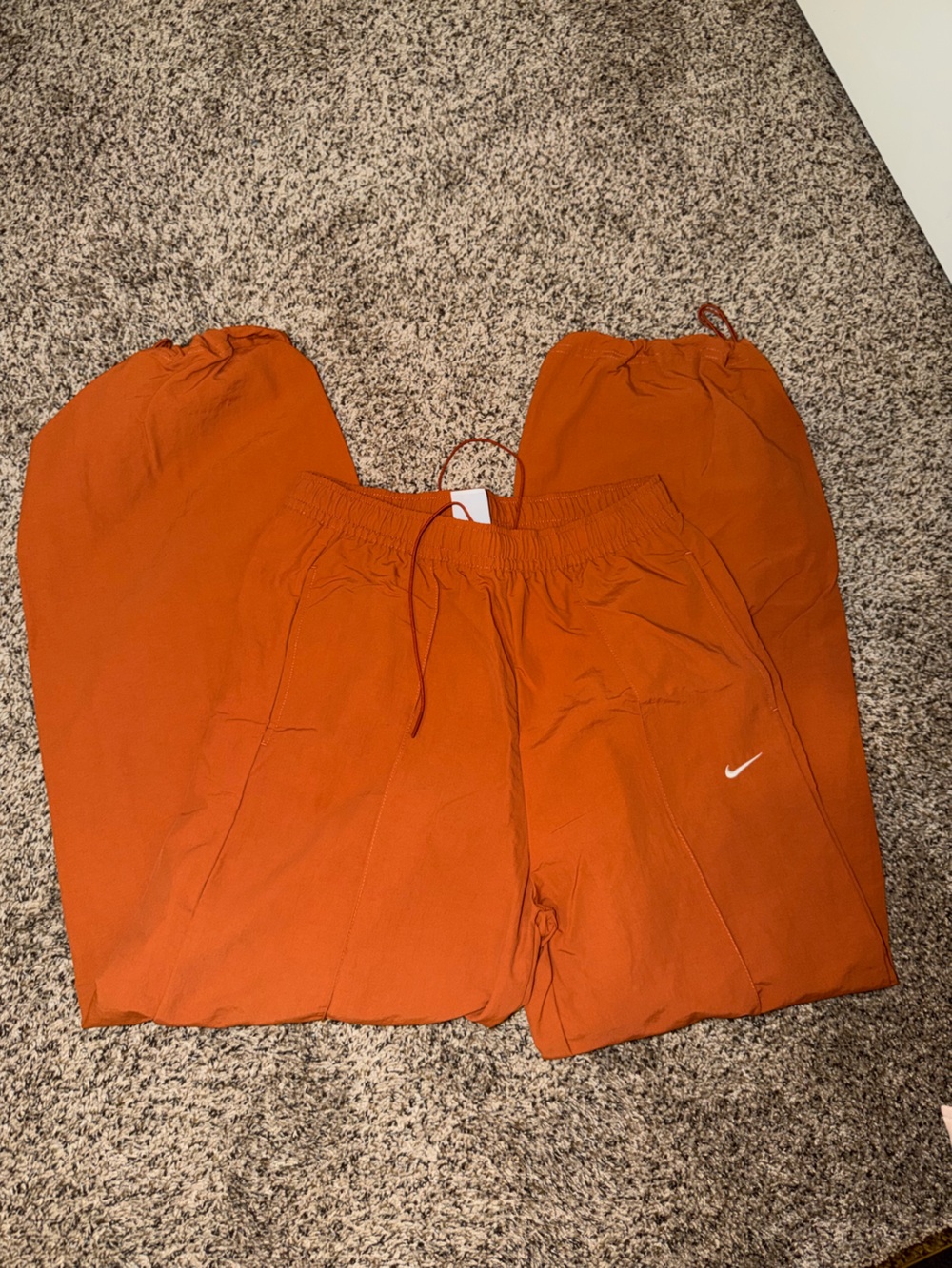 Nike Orange Jogger Track Pants with White Swoosh